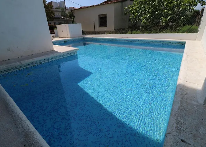 Turo 4 - Piso con piscina comunitaria